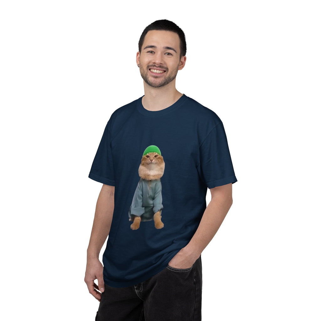 Man wearing a navy blue t-shirt with a graphic of a character in a green hat on a white background