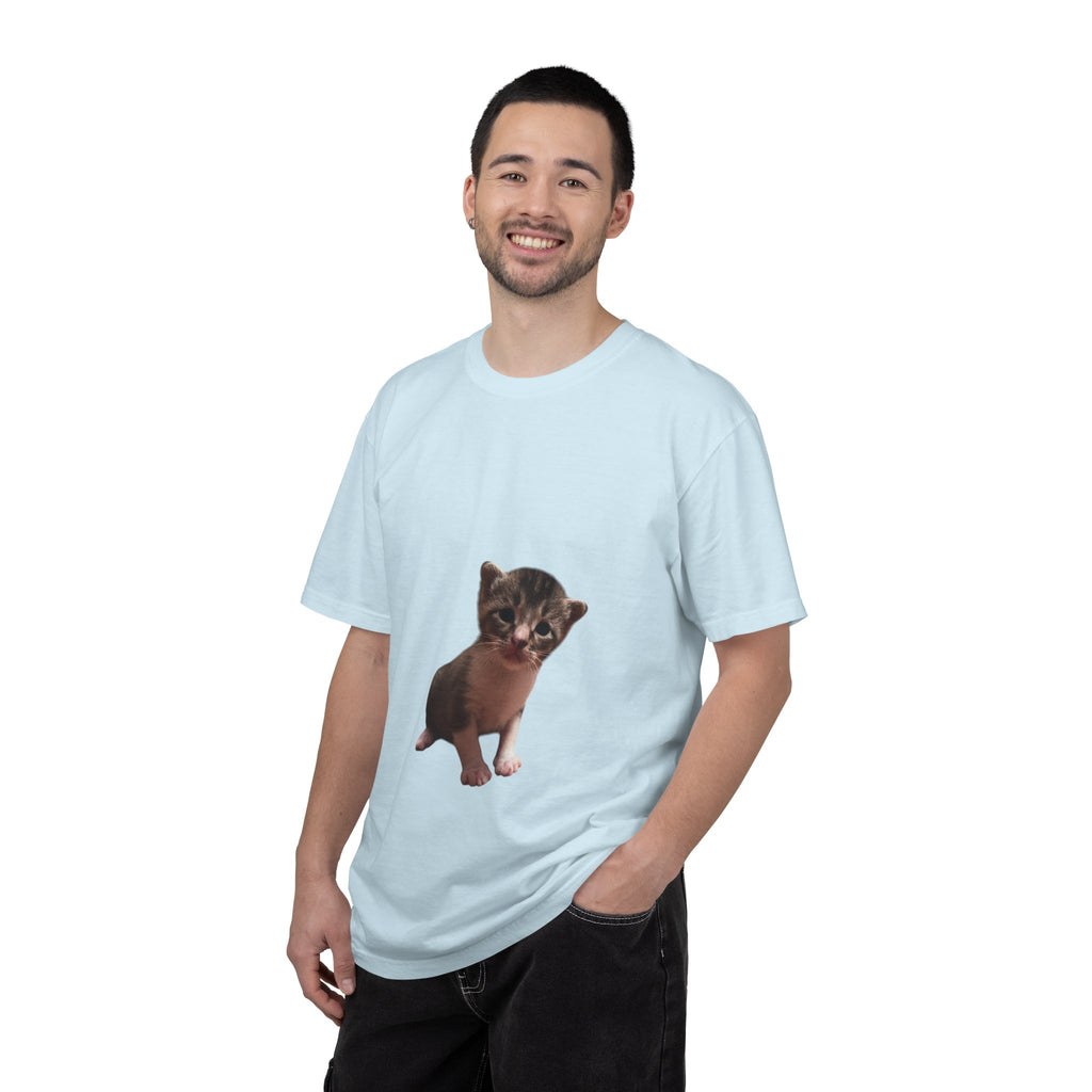 Man wearing a light blue t-shirt with a graphic of a small animal on a white background