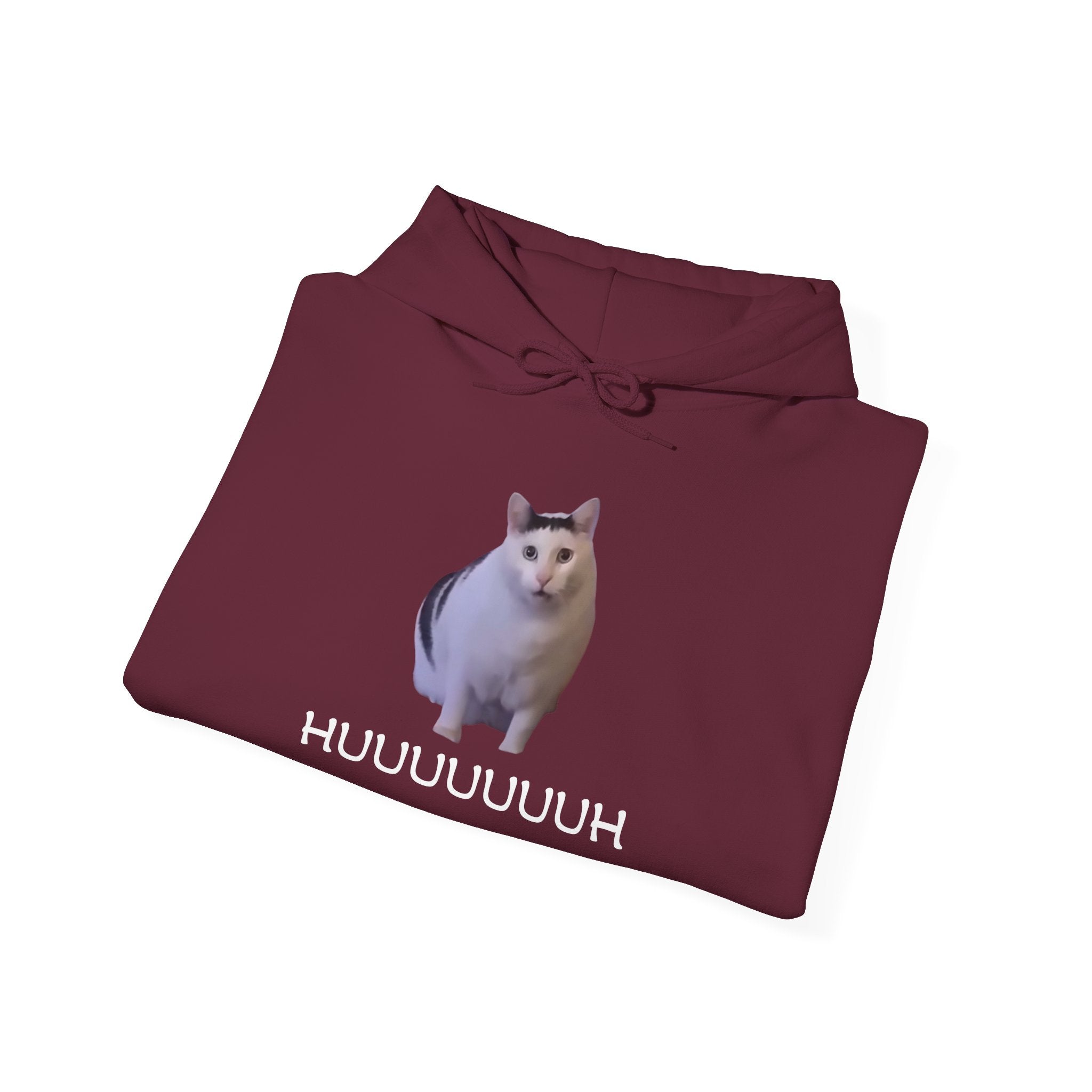 Folded maroon hoodie with a cat graphic and text on a white background