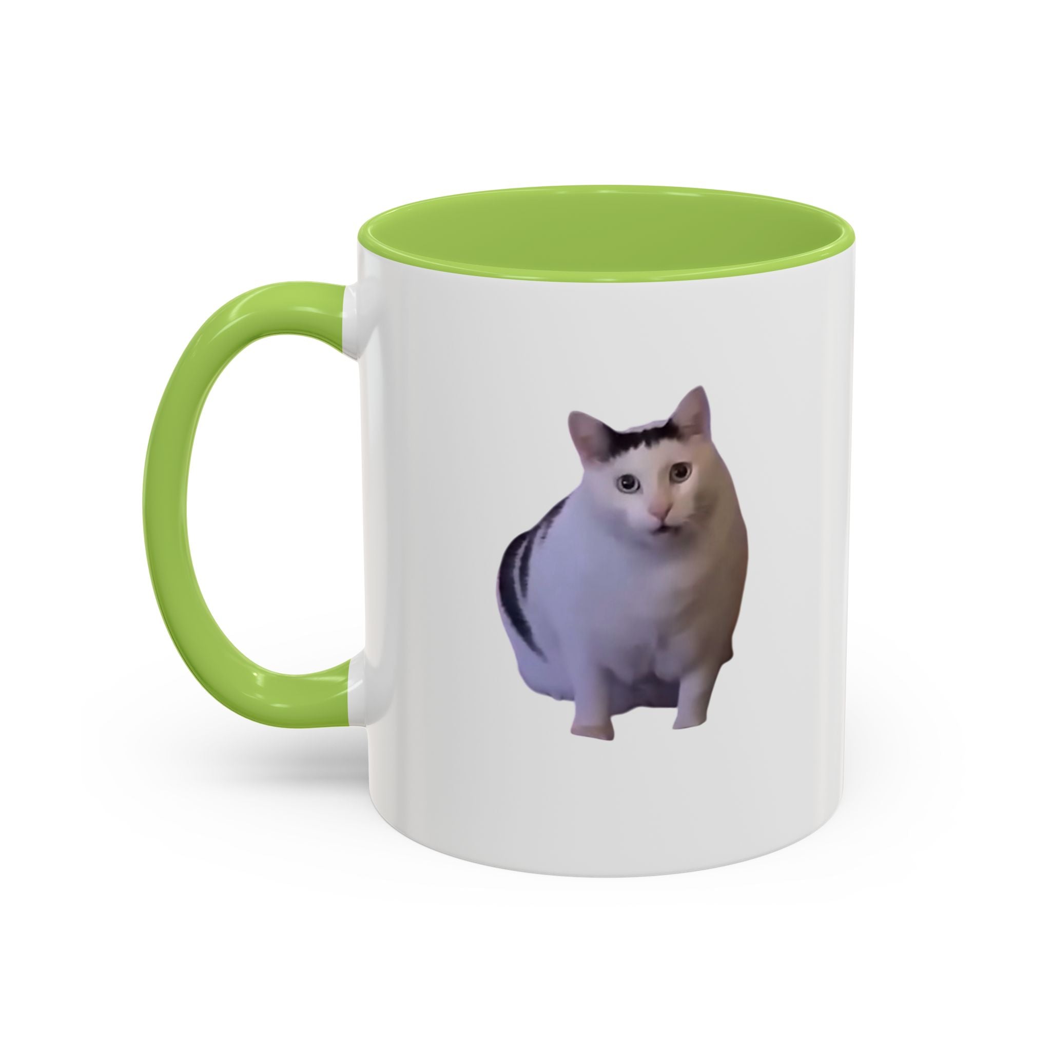 White mug with green interior and handle featuring a cat illustration on a white background