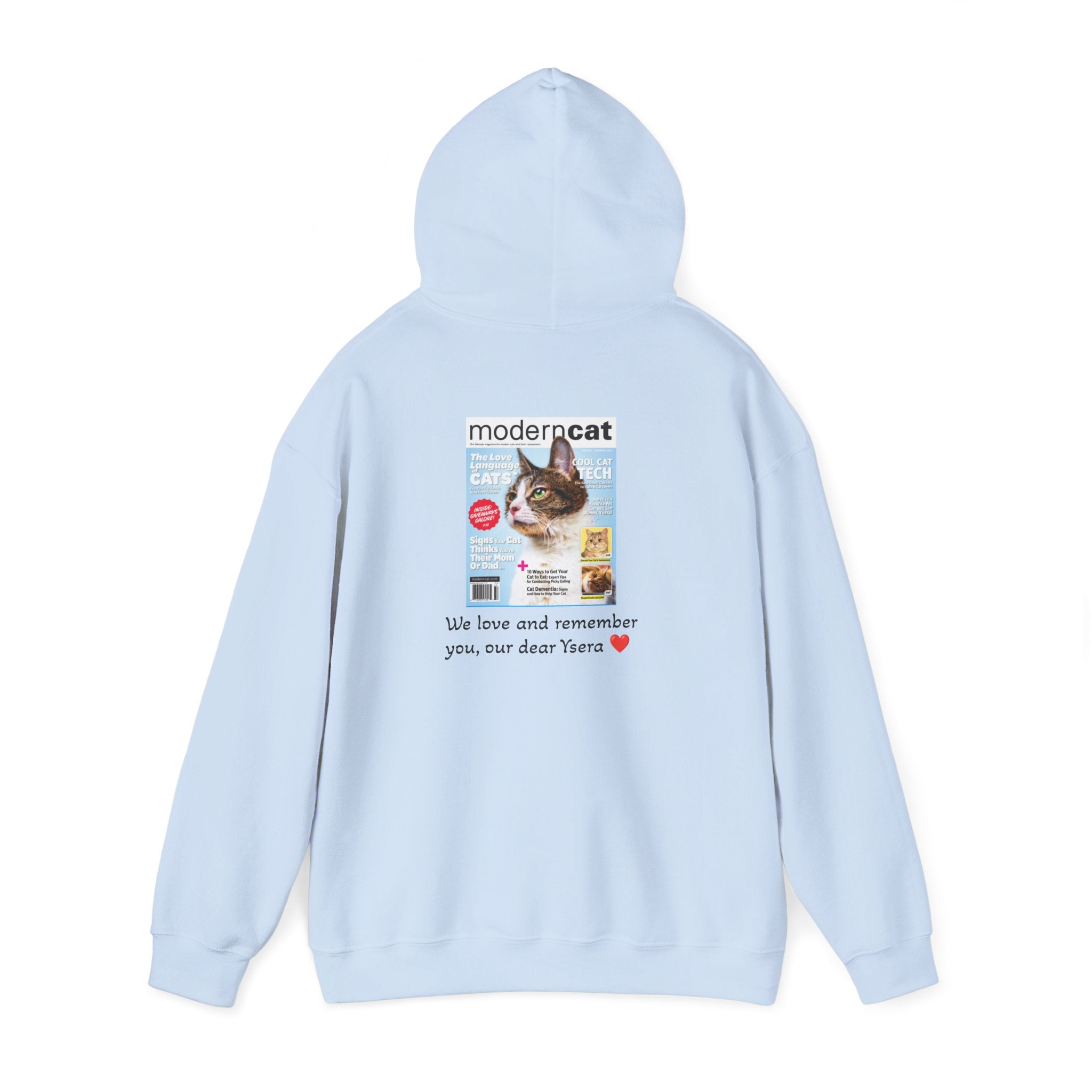Light blue hoodie with a cat magazine cover design on the back