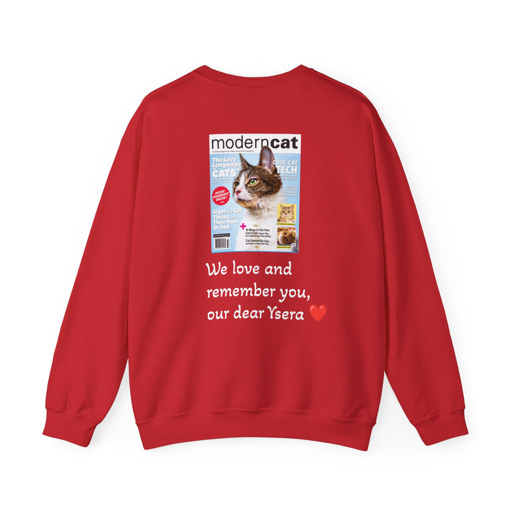 Red sweatshirt with a printed design of a cat magazine cover and text on the back.