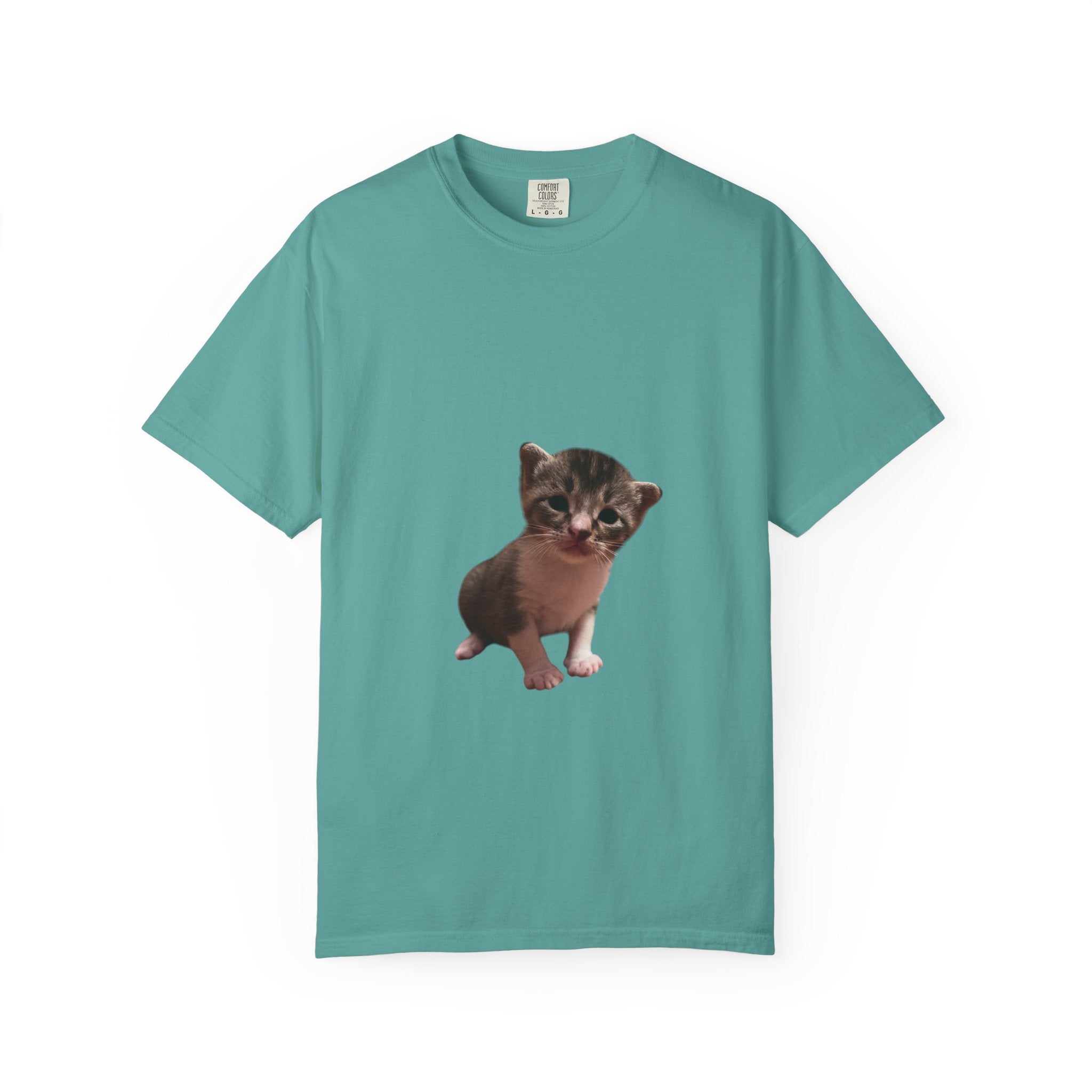 Teal t-shirt with a kitten graphic on a white background