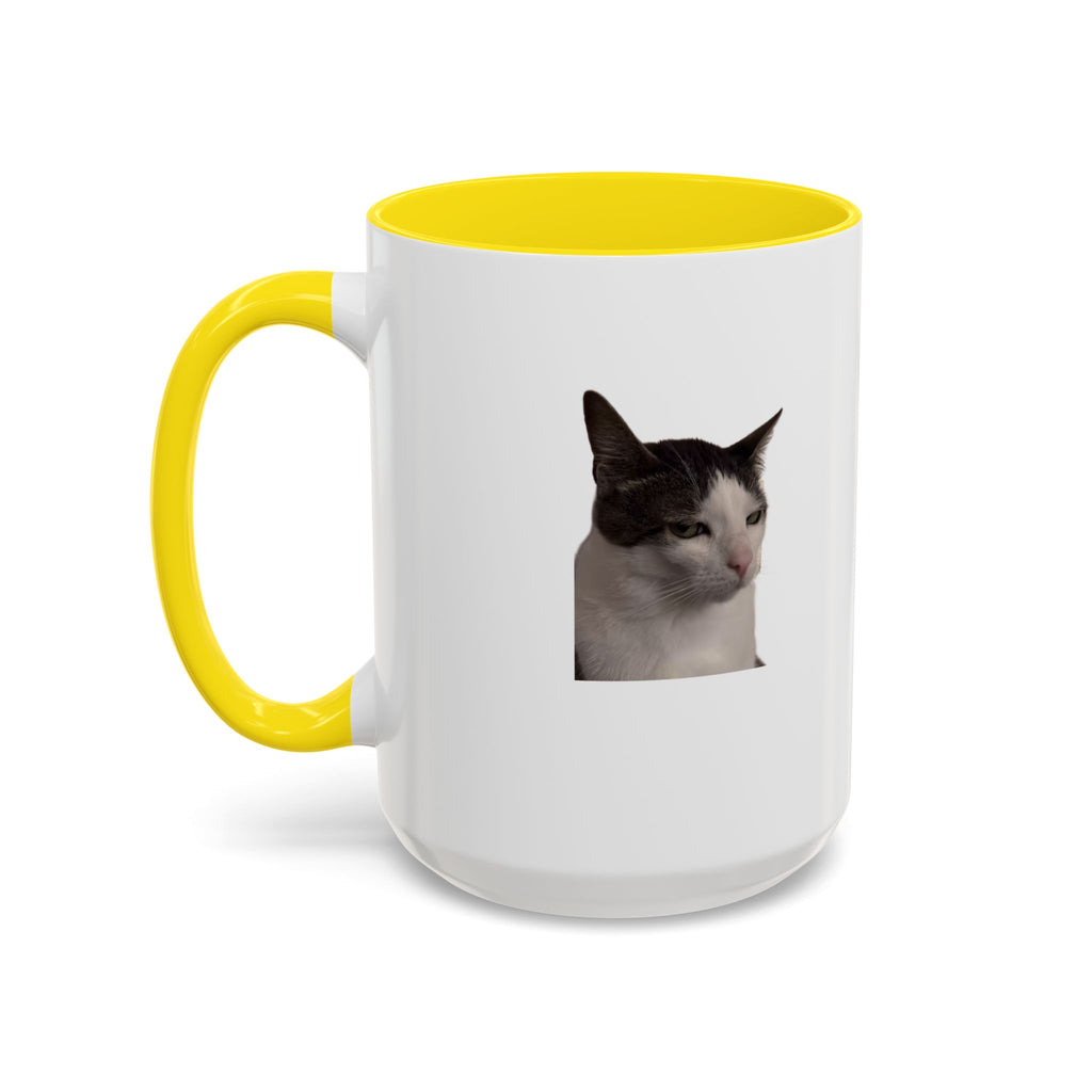 White mug with yellow handle featuring a cat's face on a white background