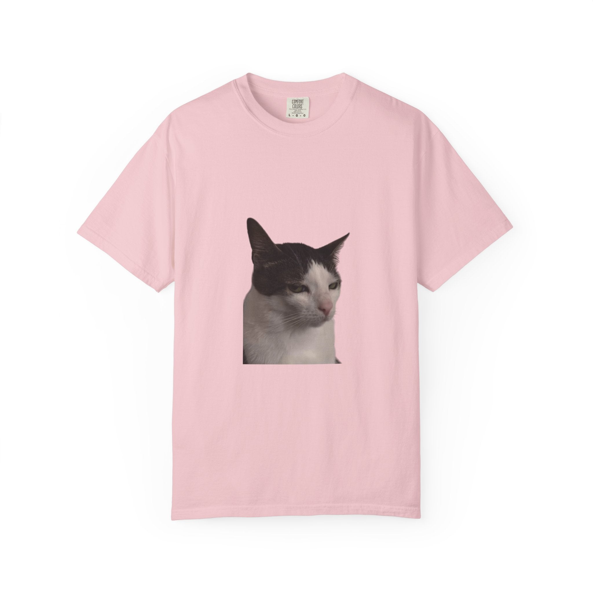 Pink t-shirt with a cat graphic on a white background