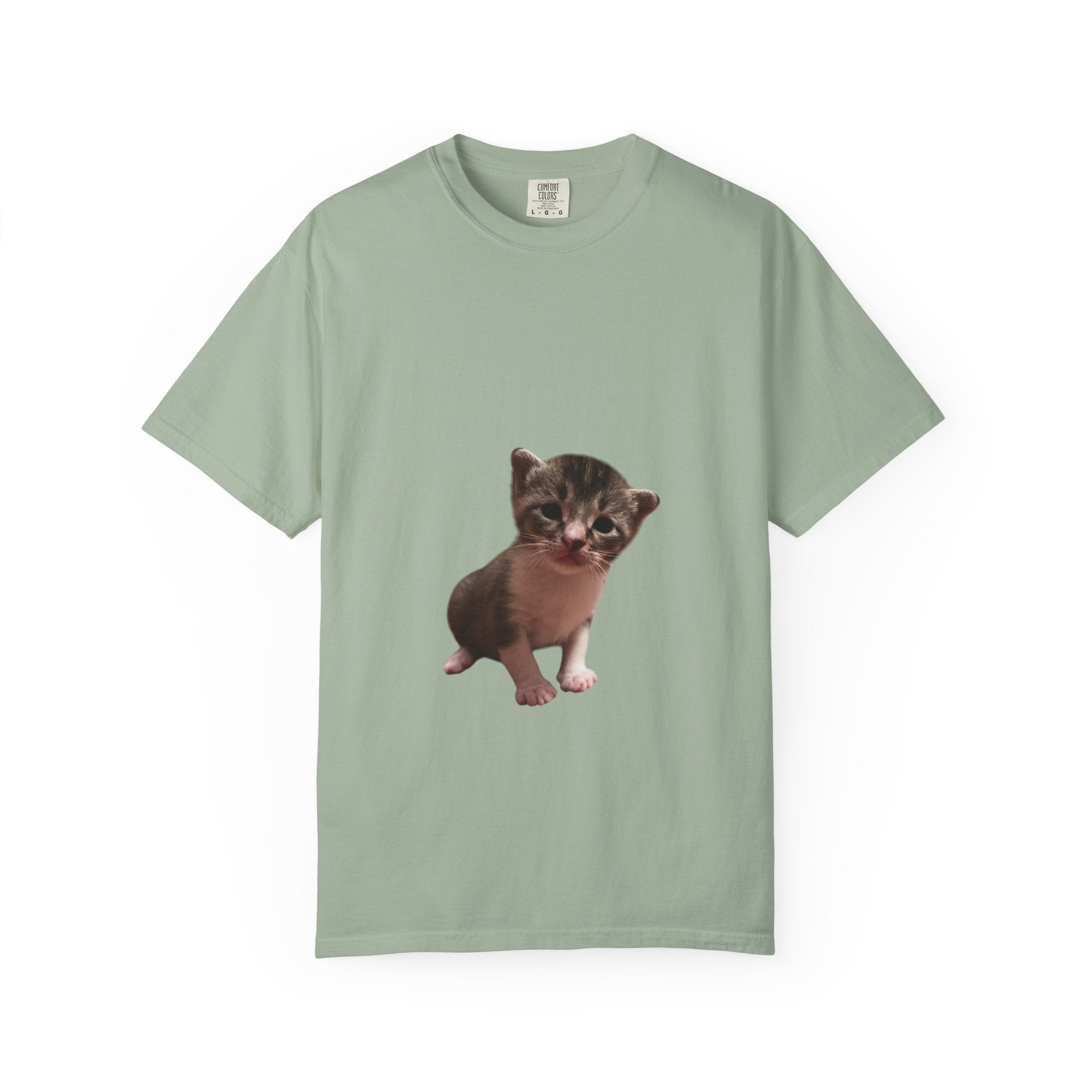 Light green t-shirt with a kitten graphic on a white background